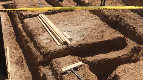 Footing trenches excavated for a foundation